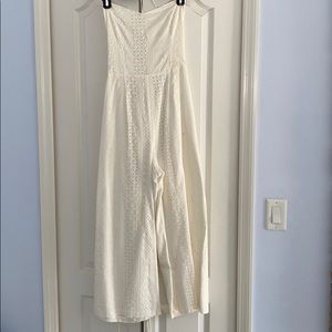 White eyelet jumpsuit with crisscross tie back